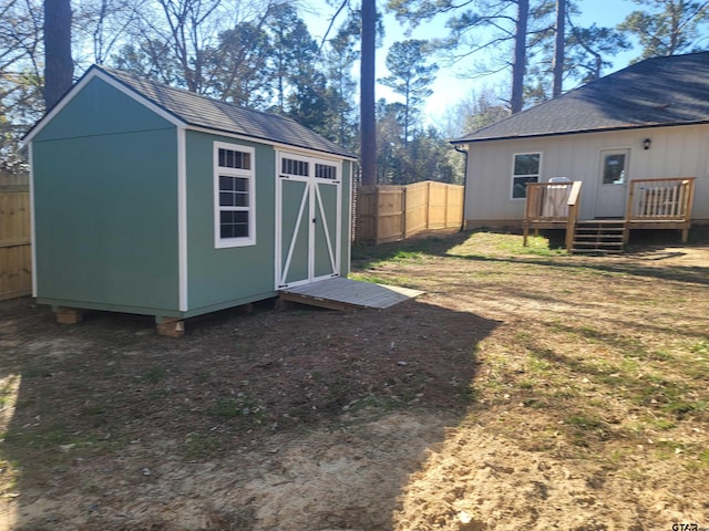 view of shed featuring a fenced backyard