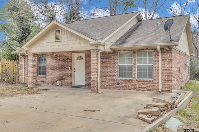 view of front of house with a patio area