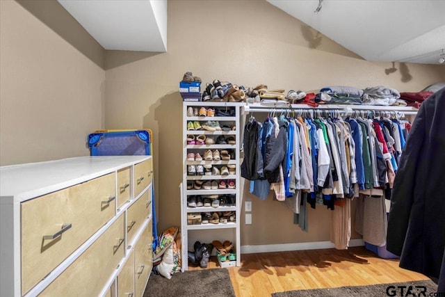 6841 Fm 778, Hawkins, TX 75765 - walk in closet with light wood finished floors and lofted ceiling