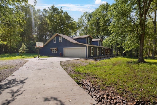 6841 Fm 778, Hawkins, TX 75765 - view of front facade featuring an attached garage, concrete driveway, and a front yard