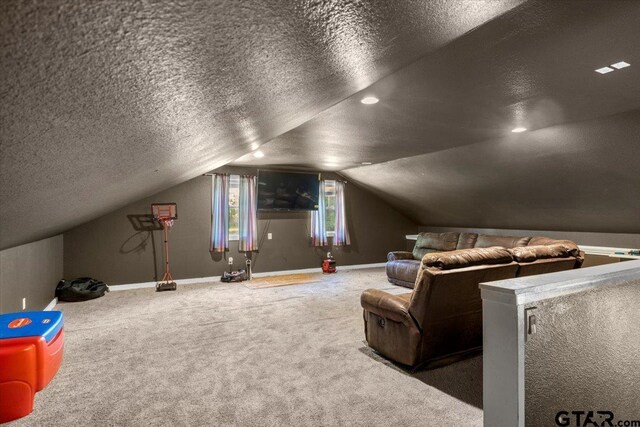 6841 Fm 778, Hawkins, TX 75765 - carpeted home theater room with a textured ceiling, baseboards, and vaulted ceiling
