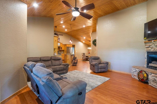 6841 Fm 778, Hawkins, TX 75765 - living room with wood ceiling, a ceiling fan, vaulted ceiling, and light wood-type flooring