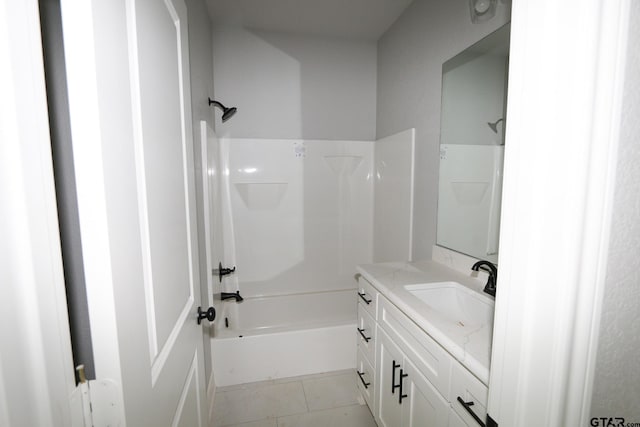 bathroom featuring vanity, shower / tub combination, and tile patterned flooring