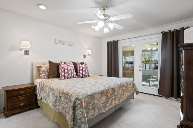 bedroom with a ceiling fan, ornamental molding, french doors, light colored carpet, and access to outside