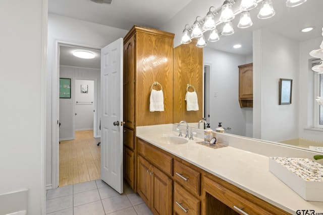 bathroom featuring tile patterned floors and vanity