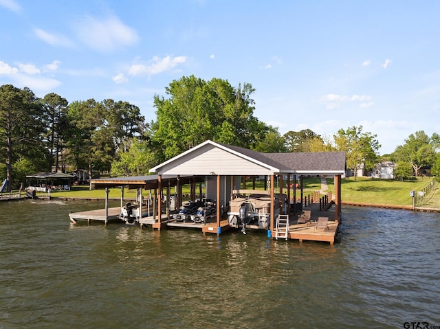 view of dock featuring boat lift and a water view