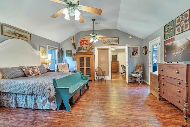 bedroom featuring hardwood / wood-style floors, ceiling fan, and vaulted ceiling