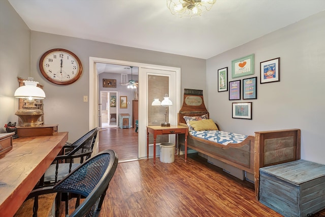 bedroom with dark wood-type flooring and a closet