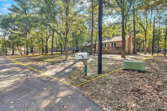 surrounding community featuring a deck