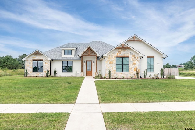 view of front of home with a front yard