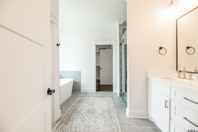 bathroom with vanity, ornamental molding, and plus walk in shower