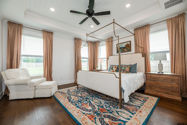 bedroom with a tray ceiling, ceiling fan, wood ceiling, and dark hardwood / wood-style floors