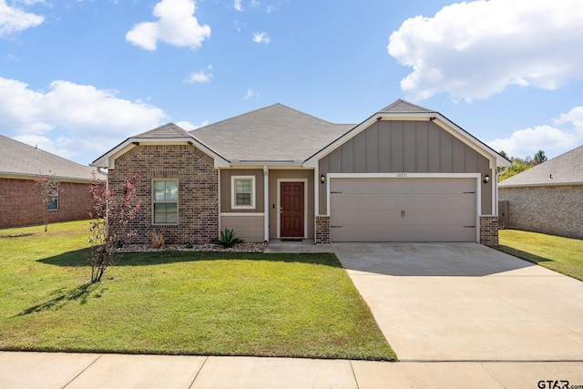 view of front facade featuring a garage and a front lawn