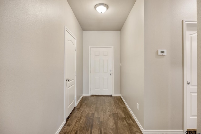 hallway featuring hardwood / wood-style floors