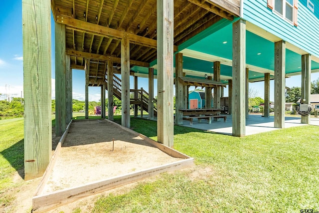 exterior space featuring a lawn and a patio