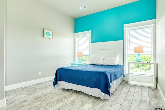 bedroom featuring light wood-type flooring