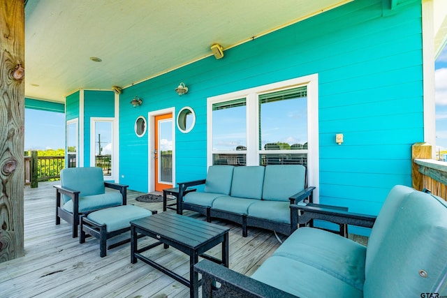 deck featuring an outdoor living space