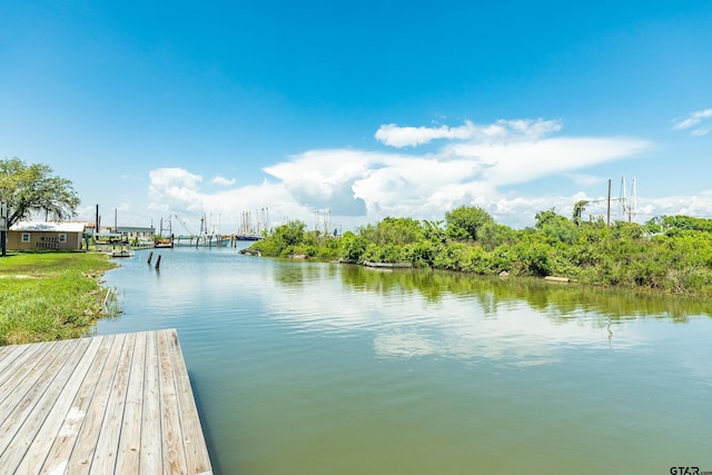 view of dock with a water view