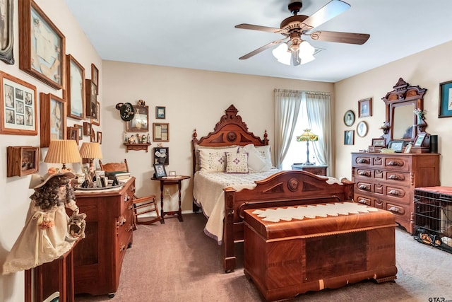 carpeted bedroom featuring baseboards and a ceiling fan