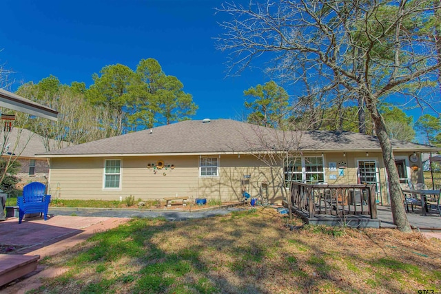 rear view of property featuring a patio