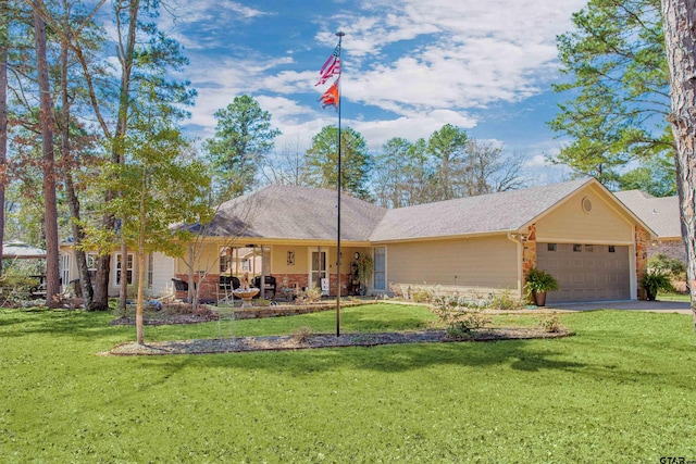 single story home with a garage, driveway, and a front yard