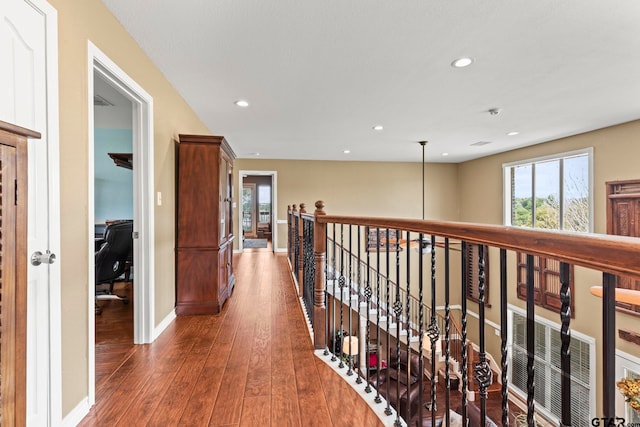 hallway featuring dark wood-type flooring