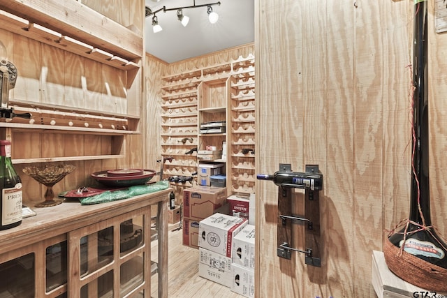 23120 Saddle Ridge Ct, Lindale, TX 75771 - wine area with wood finished floors and wood walls
