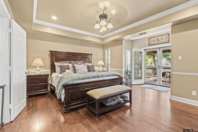 23120 Saddle Ridge Ct, Lindale, TX 75771 - bedroom featuring access to outside, a tray ceiling, ornamental molding, dark wood finished floors, and baseboards