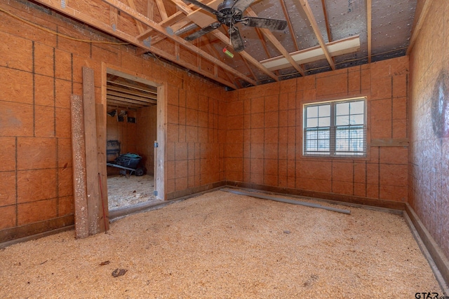 interior space featuring ceiling fan