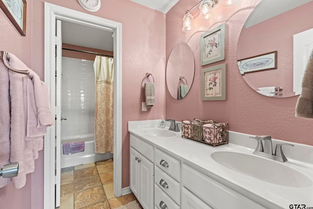 bathroom with vanity and shower / bath combo with shower curtain