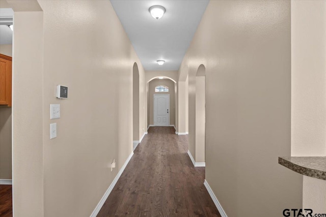 hall featuring dark hardwood / wood-style floors