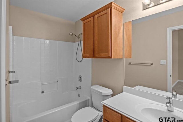 full bathroom featuring vanity, shower / bath combination, and toilet