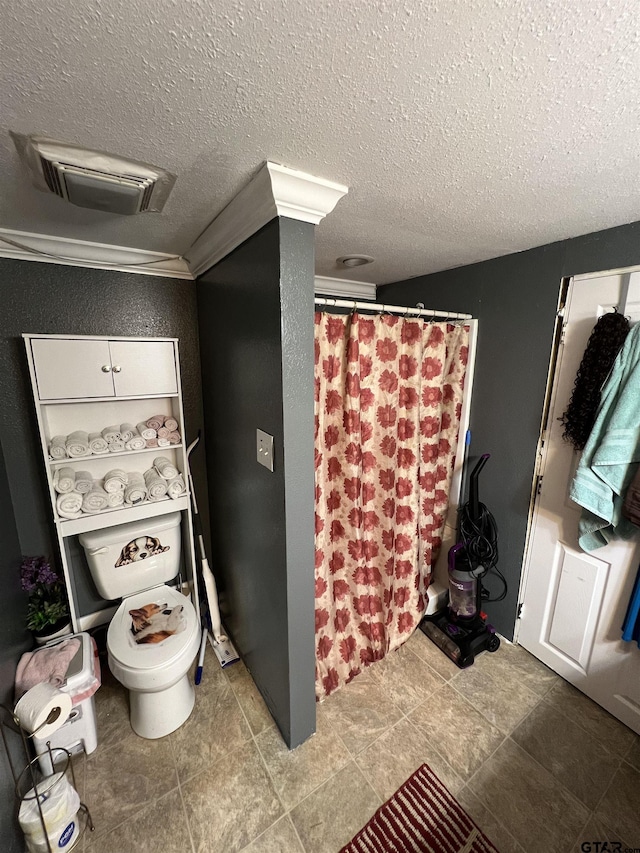 113 W Paschal St, Troup, TX 75789 - bathroom with a textured ceiling and a shower with curtain