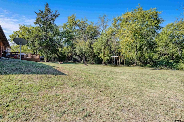 view of yard featuring a deck