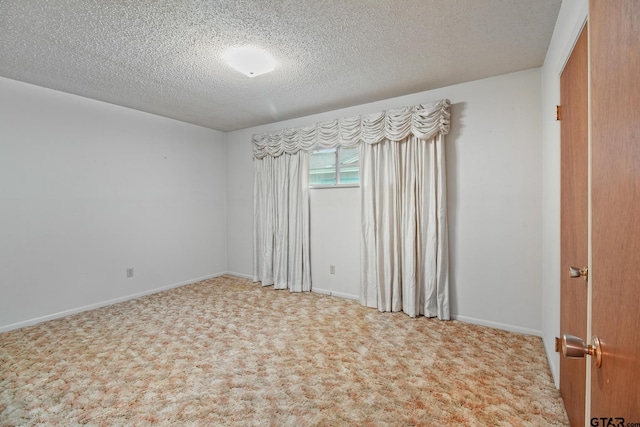2742 Lisa Ln, Tyler, TX 75701 - unfurnished room featuring a textured ceiling and carpet