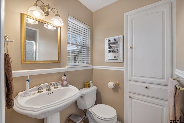 311 E Amherst St, Tyler, TX 75703 - bathroom featuring a sink and toilet