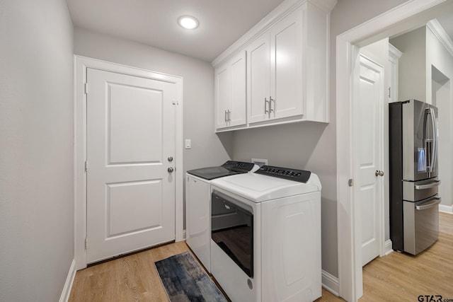 19128 Ambrosia Dr, Flint, TX 75762 - washroom with washing machine and clothes dryer, light wood-type flooring, cabinet space, baseboards, and recessed lighting