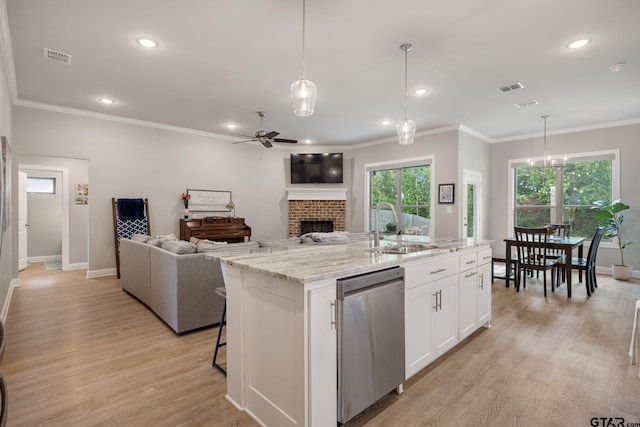 19128 Ambrosia Dr, Flint, TX 75762 - kitchen featuring stainless steel dishwasher, a fireplace, ceiling fan, baseboards, and crown molding