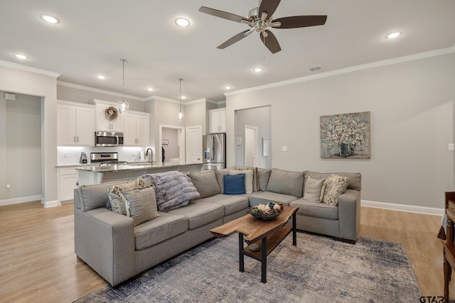 19128 Ambrosia Dr, Flint, TX 75762 - living area with ceiling fan, light wood-style floors, recessed lighting, baseboards, and ornamental molding