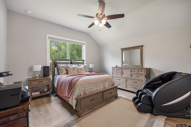 19128 Ambrosia Dr, Flint, TX 75762 - bedroom featuring wood finished floors, vaulted ceiling, and a ceiling fan