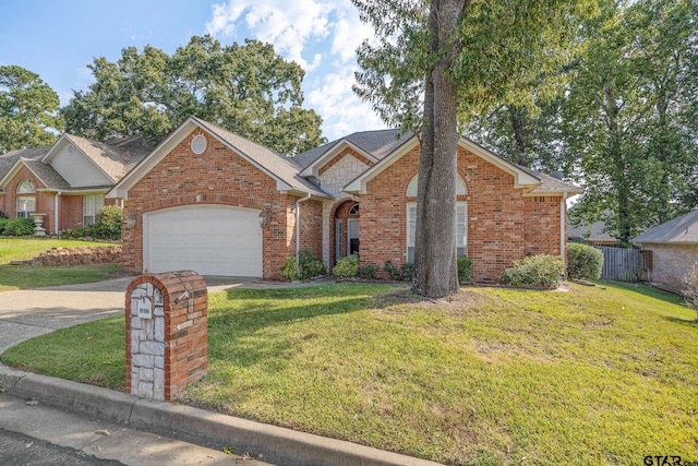 view of front property featuring a garage and a front lawn