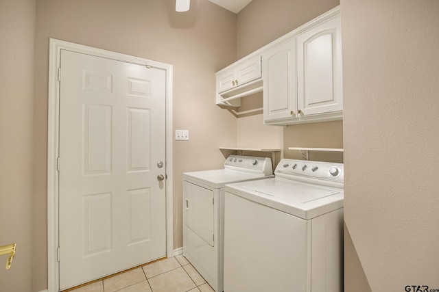 laundry room featuring cabinets, washing machine and dryer, light tile patterned flooring, and ceiling fan