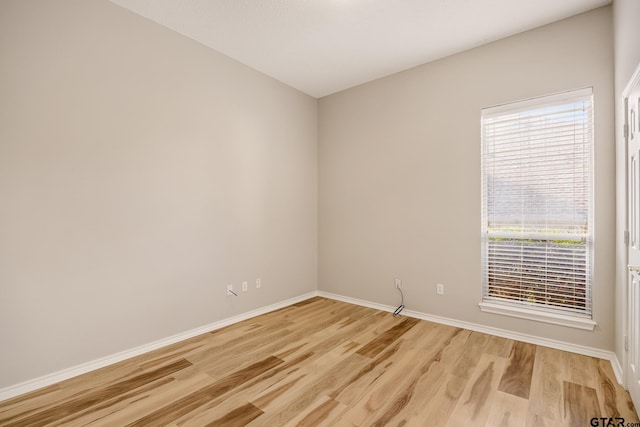 empty room featuring light hardwood / wood-style floors