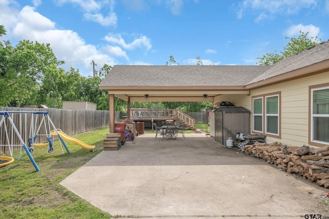 view of patio featuring a playground