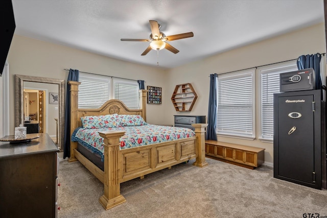 bedroom with light carpet and ceiling fan