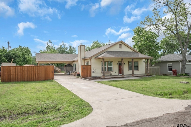 view of front of property featuring a porch and a front lawn