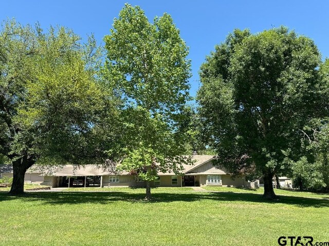 408 Cumberland Rd, Tyler, TX 75703 - view of front of property with a front lawn