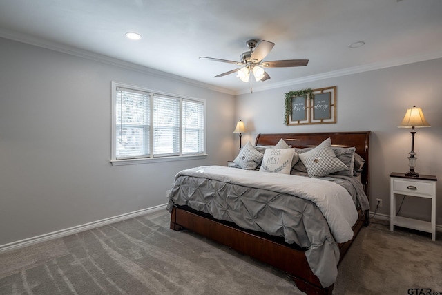 carpeted bedroom featuring ornamental molding and ceiling fan