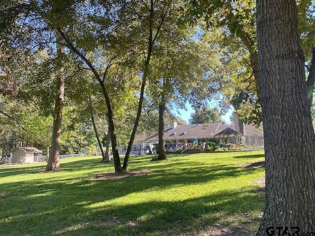 view of yard with a residential view and fence