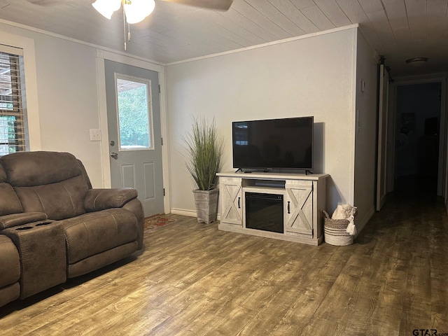 living room featuring ceiling fan, wooden ceiling, wood-type flooring, and ornamental molding